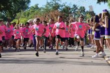 Large group of students at the starting line of a fundraiser fun run