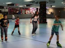 Students skating at Rollerland