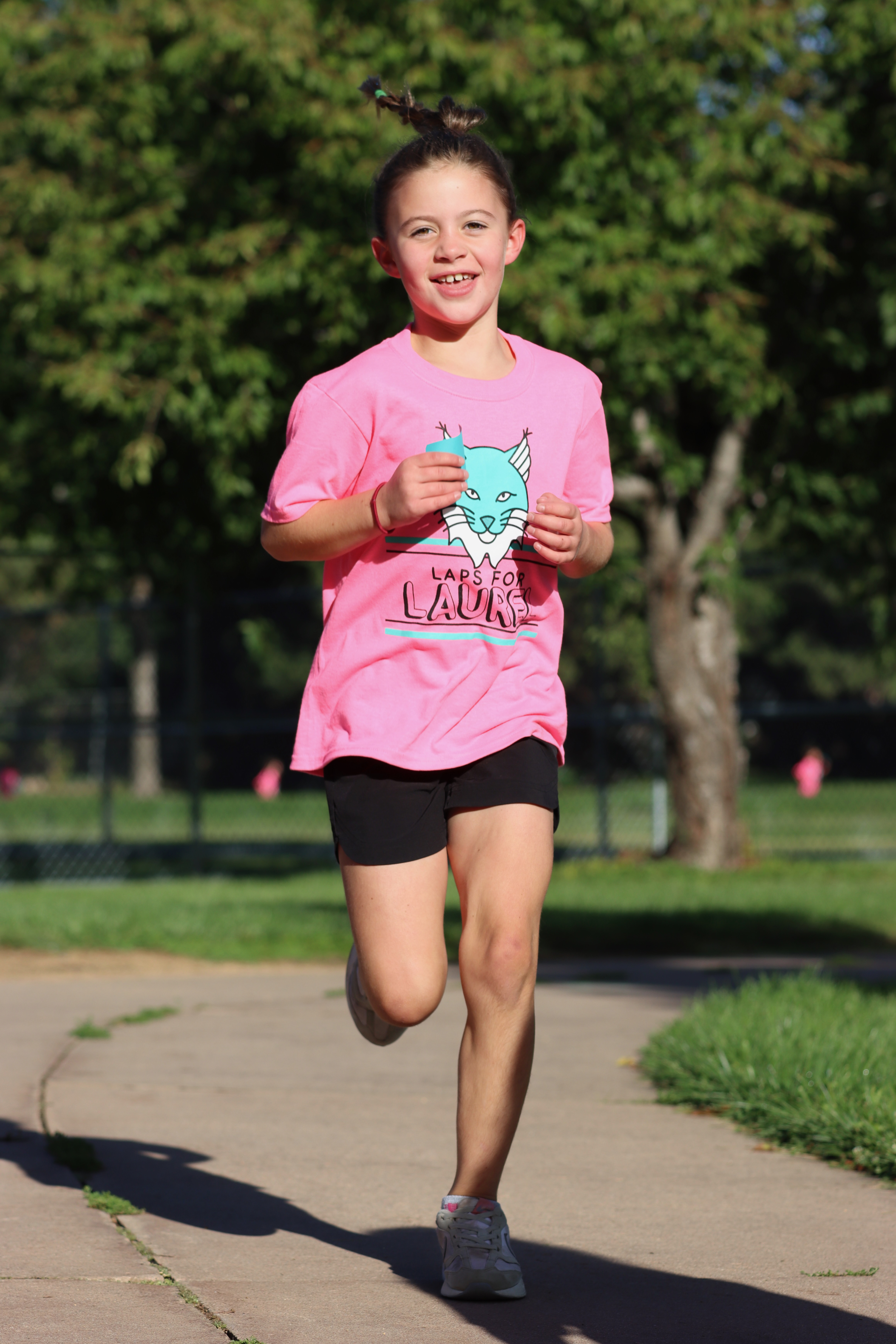 Student running during school fundraiser