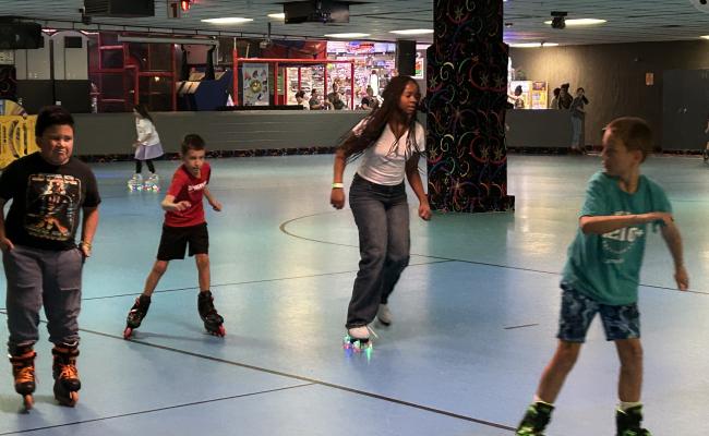 Students skating at Rollerland